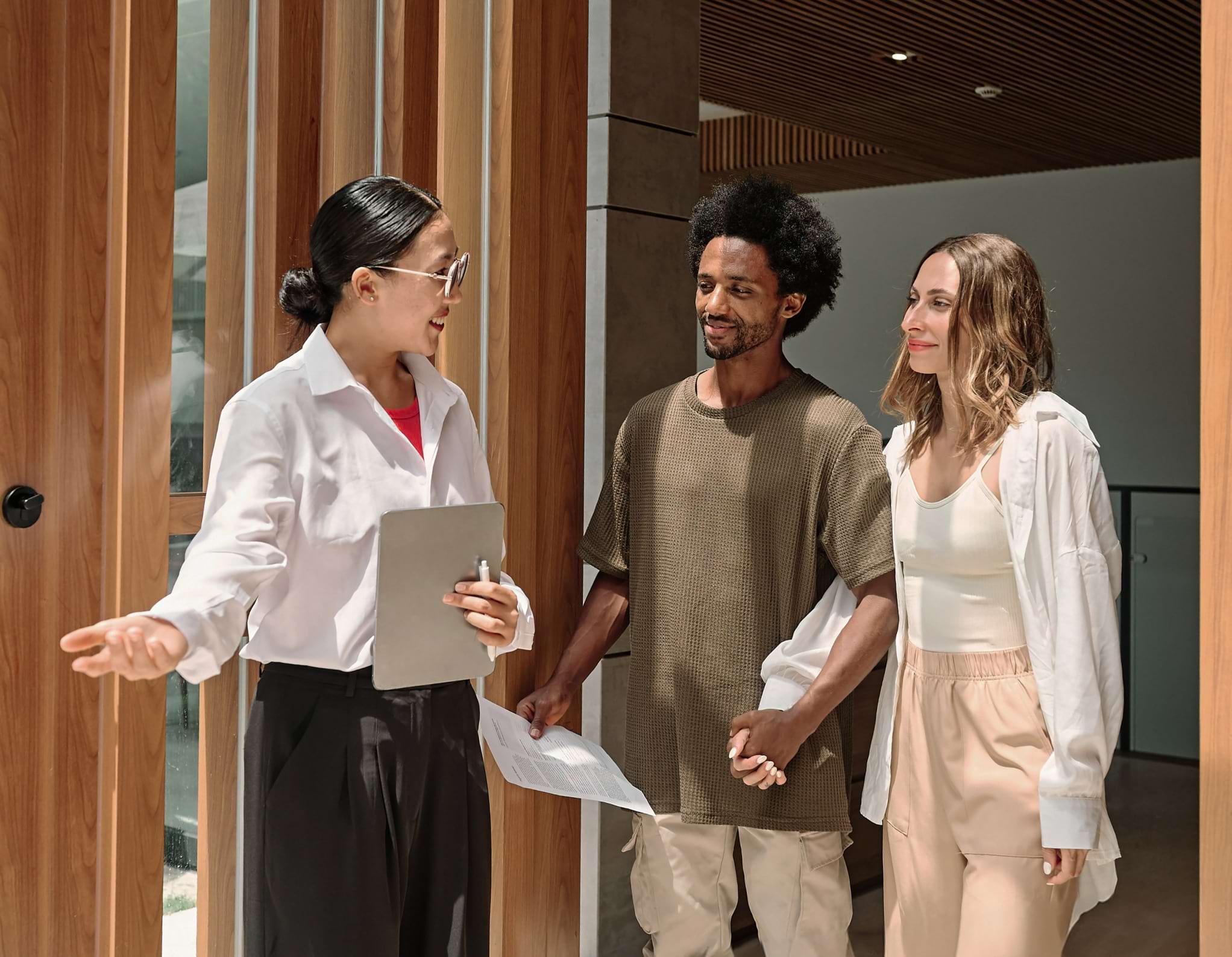 Apartment leasing agent giving a prospective tenants a tour.