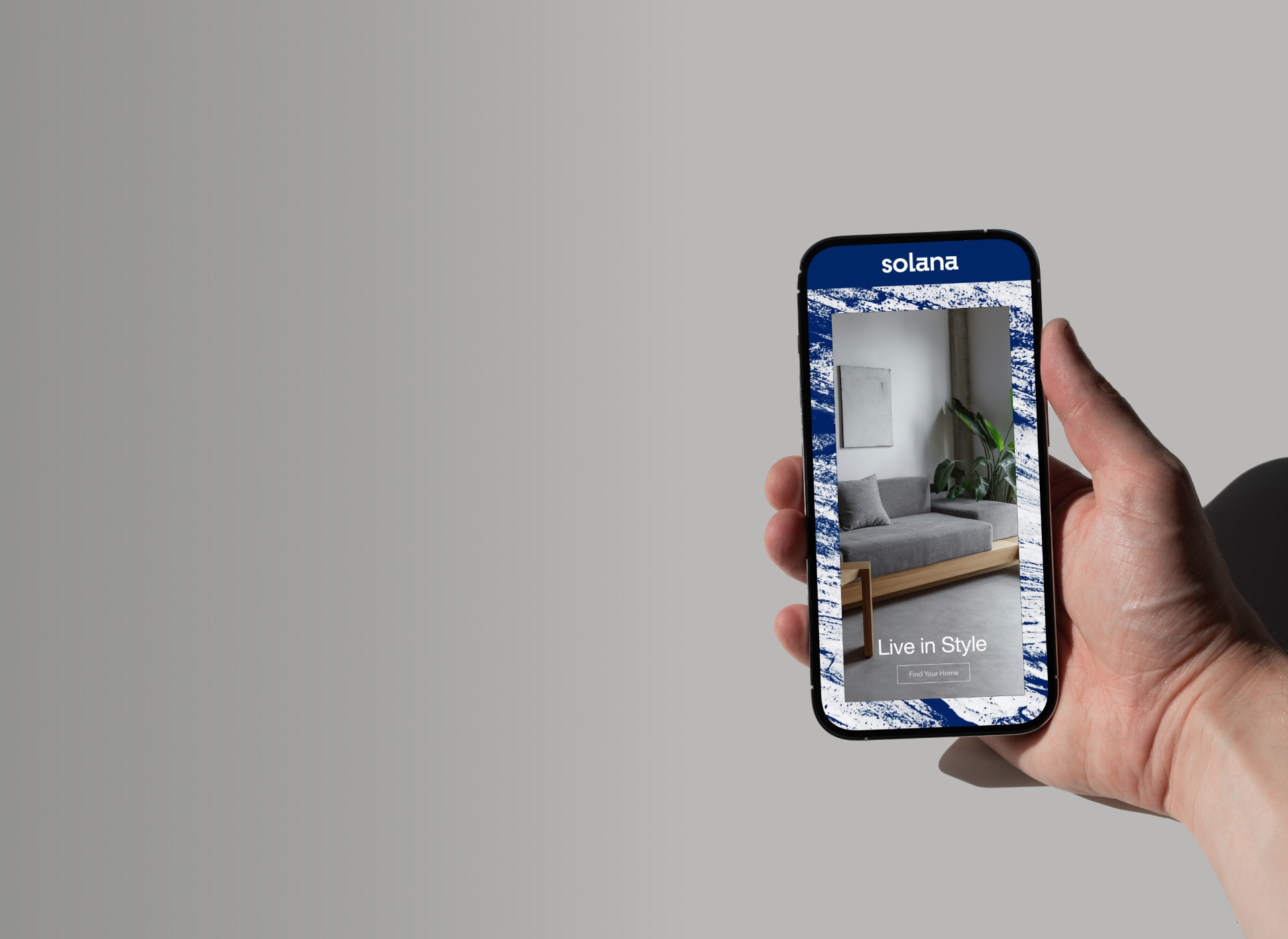 hand holding an iphone showcasing Brand Boost branding